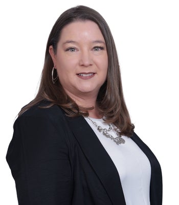 Portrait of Alicia Vigil, Associate Broker / Realtor®.